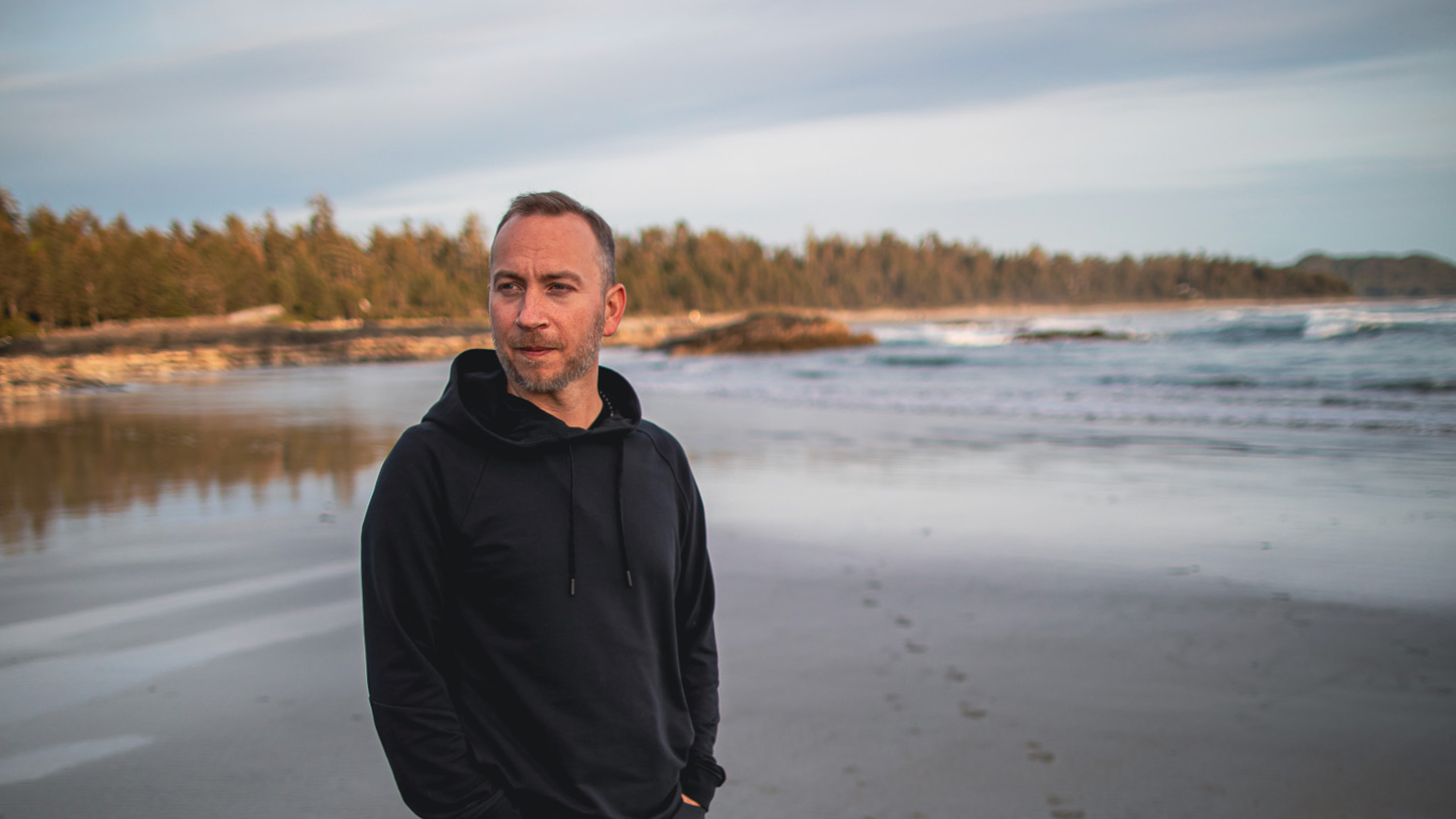 Man reflecting, representing the hidden cost of undercharging